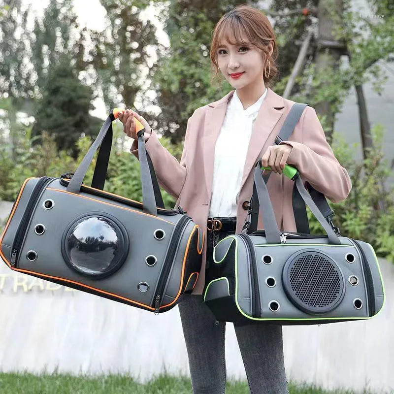 photo of girl holding two colors of the breathable pet carrier